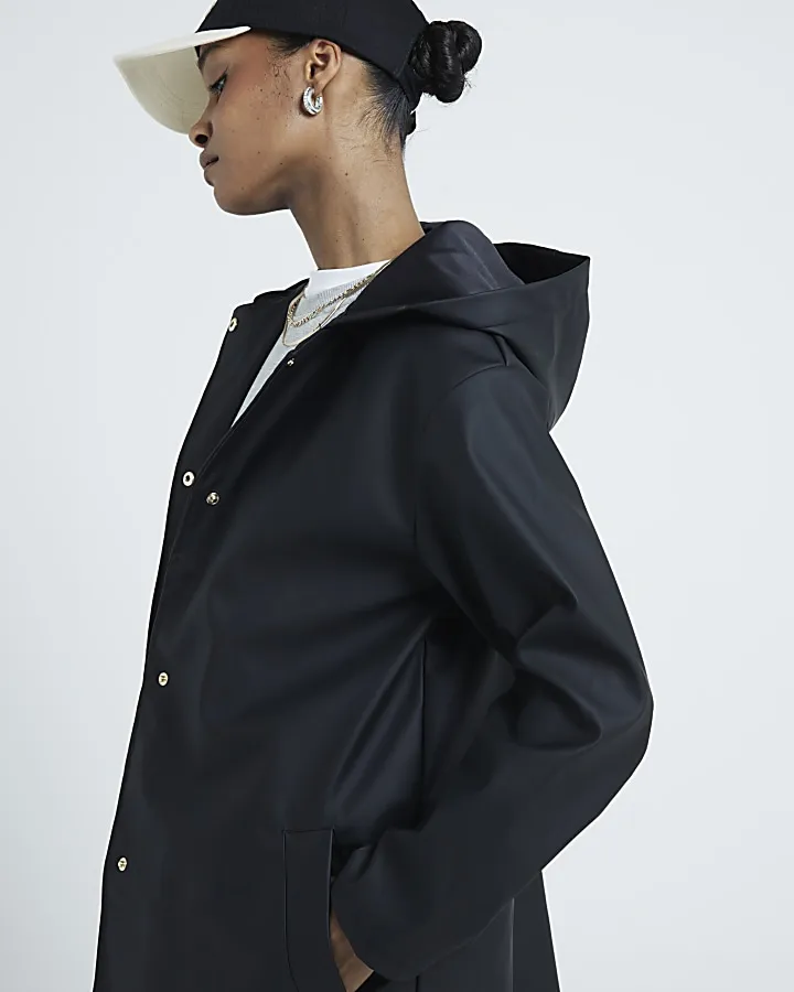 Black hooded rain coat